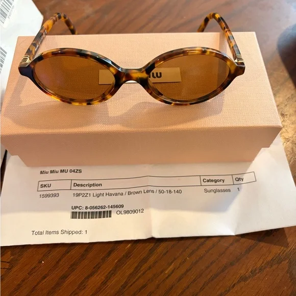 Miu Miu Tortoiseshell Oval Sunglasses with Brown Lenses - Picture 6 of 6